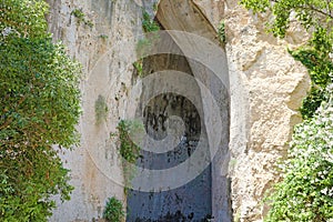Limestone cave Ear of Dionysius Orecchio di Dionisio a cave with acoustics effects inside, Syracuse Siracusa, Sicily, Italy photo
