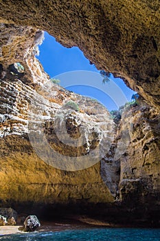 Limestone cave, open sky view on the Algarve, Portugal