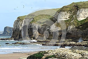 Limestone cliffs at Whiterocks Beach, Causeway Coast, Portrush, County Antrim, N. Ireland N photo
