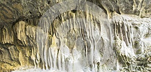 Limestone at the entrance of a cave photo
