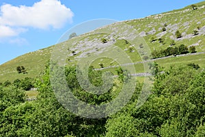 Limestone Formations in Meadows on Hill over Bolton Bridge, Wharfedale, Yorkshire Dales, England, UK