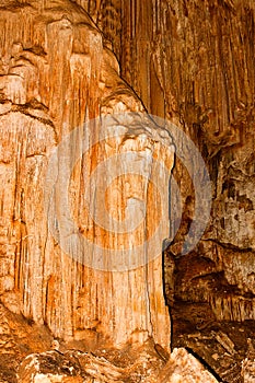 Limestone formations on the wall of an underground cave.