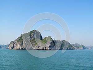 Limestone island in the sea bay