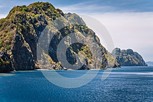 Limestone karst mountains of Matinloc Island. El Nido, Palawan, Philippines