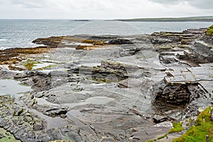 Limestone landscape on the coast in the coastal walk route from Doolin to the Cliffs of Moher