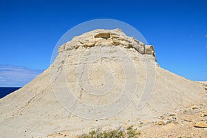 Limestone mound at Marsalforn, Gozo. photo