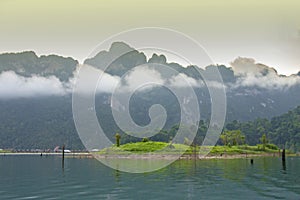 Limestone Mountain and morning mist and beautiful view neture in the Cheow Lan dam Khao Sok National Park, Thailand