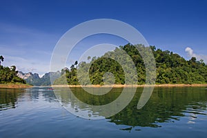 Limestone Mountain and morning mist and beautiful view neture in the Cheow Lan dam Khao Sok National Park, Thailand