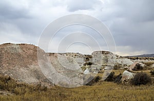 Limestone pyramids with beautiful old rock formations in Cappadocia, Goreme, Turkey