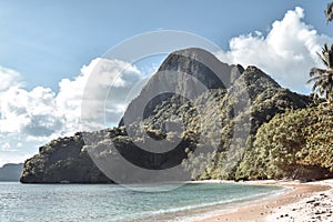 Limestone rock on a beautiful tropical Paradise beach in El Nido Palawan Island the Philippines