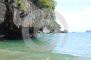 Limestone rock formation with trees and sea at Puerto Princesa, Palawan, Philippines