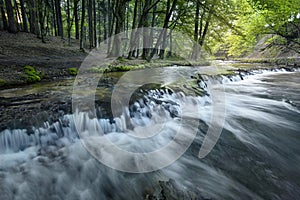 Limestone rock steps create a waterfall