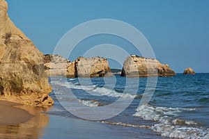 Limestone rocks  on the Praia dos Tres Castelos in Portimao, Portugal