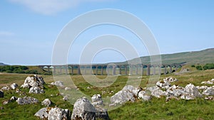 Limestone rocks and Ribblehead viaduct. photo