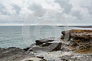 Limestone rocks and the sea along the coastal walk route from Doolin to the Cliffs of Moher