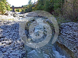 Limestone rocks and the upper course of the Mirna River in the village of Kotli - Buzet, Croatia / Vapnenacke stijene i gornji tok