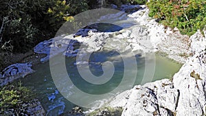 Limestone rocks and the upper course of the Mirna River in the village of Kotli - Buzet, Croatia / Vapnenacke stijene i gornji tok