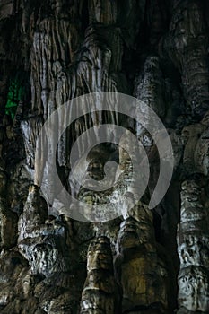 Limestone stalactites in Adygeya underground cave, speleology grotto