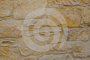 Stone built wall closeup with pattern and texture.
