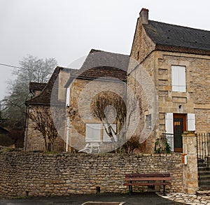 Limeuil, in the Dordogne-PÃ©rigord region in Aquitaine, France. Medieval village with typical houses perched on the hill