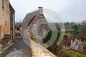 Limeuil, in the Dordogne-PÃ©rigord region in Aquitaine, France. Medieval village with typical houses perched on the hill