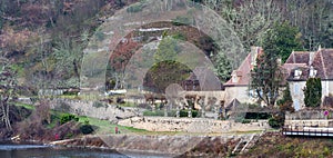 Limeuil, in the Dordogne-PÃ©rigord region in Aquitaine, France. Medieval village with typical houses perched on the hill,