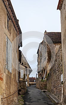 Limeuil, in the Dordogne-PÃ©rigord region in Aquitaine, France. Medieval village with typical houses perched on the hill,