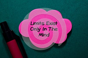 Limit Exist Only in The Mind write on stick note isolated on Office Desk