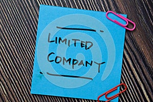 Limited Company write on sticky notes isolated on office desk