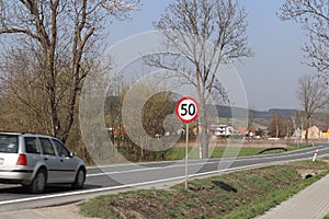 Limiting the speed of traffic to 50 km/h. Road sign on the highway. safety of traffic. Motor transportation of passengers and carg