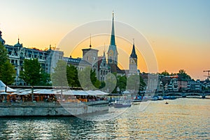 Limmat river and Zurich at sunset photo