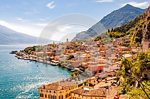 Limone Sul Garda cityscape on the shore of Garda lake surrounded by scenic Northern Italian nature. Amazing Italian cities of