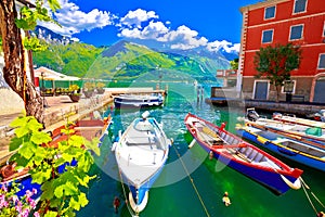 Limone sul Garda turquoise waterfront and boats view photo