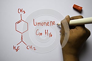 Limonene C10,H16 molecule written on the white board. Structural chemical formula. Education concept