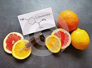 Limonene essential oil with structural chemical formula of limonene. Citrus fruit lemon, grapefruit, orange, spa concept