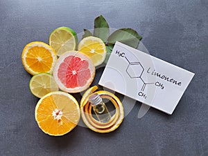 Limonene essential oil with structural chemical formula of limonene. Citrus fruit lime, lemon, grapefruit, orange, spa concept