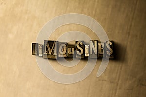 LIMOUSINES - close-up of grungy vintage typeset word on metal backdrop photo