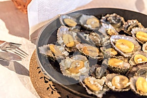 Limpets served in a restaurant in Mosteiros on the island of Sao Miguel in the Azores, Portugal