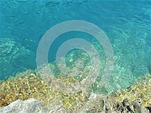 Limpid, transparent and clear water, pure environment and flowing imagination photo