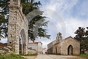 Lindar, Pazin, Istria, Croatia: the ancient church of Saint Catherine (1409) and an old arch