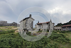 Lindoso village medieval castle and old granite granaries