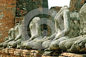 Line of ancient Buddha statues