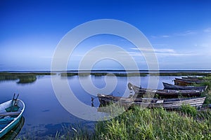 Line of Boats on Water Placed in Belarussian National Park Braslav Lakes