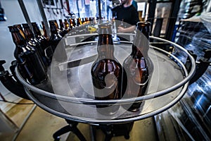 Line and bottles on microbrewery
