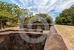 Line of brick squares as fundaments of houses, Leon Viejo, Nicaragua