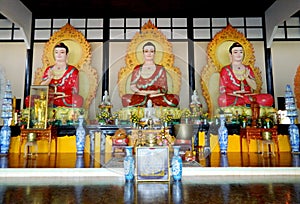 Line of buddha statues in Buddhist temple