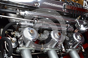 In-line classic car engine carburetors.