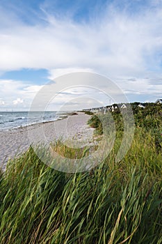 Line of colorful boathouses on the Skanor beach, Sweden