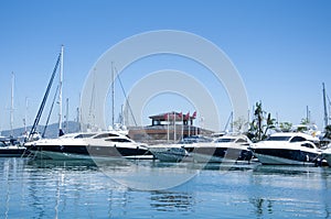 A line of cruisers berthed in Gibraltar marina