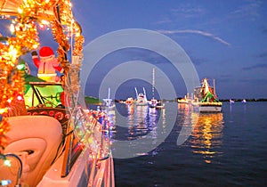 A Line of Decorated Boats Participate in a Florida Holiday Boat